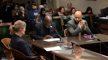Asm. Bryan listens on while witness provides testimony