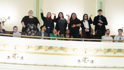 Special guests waving from the balcony