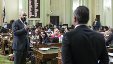 Asm. Bryan standing on Assembly Floor, addressing Mr. Hernandez