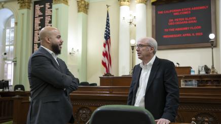 Asm. Bryan and Dr. Slavin conversing on the Assembly Floor