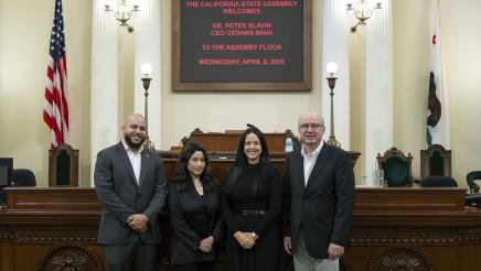 Asm. Bryan, Dr. Slavin and others posing on the Assembly Floor