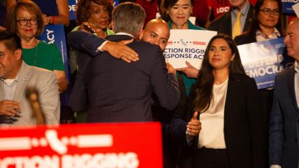 Asm. Bryan and Gov. Newsom hugging