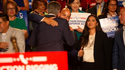 Asm. Bryan and Gov. Newsom hugging